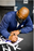 John Randle Biting Helmet Purple Jersey Signed & Professionally Framed 11x14 Photo